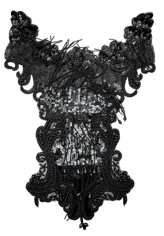 Black sequin and bead embellished bodice on a white background