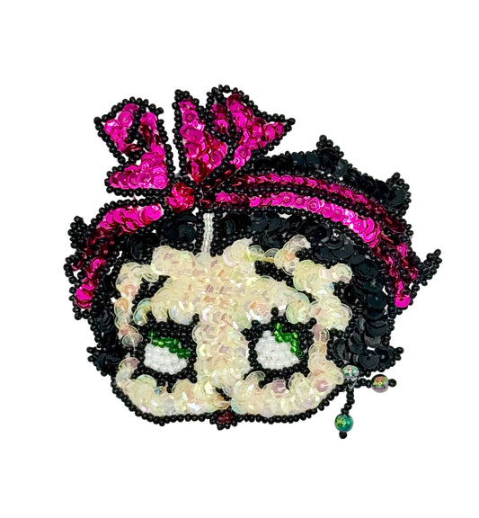 Vintage Sequined patch of a cartoon character with a pink bow on a white background