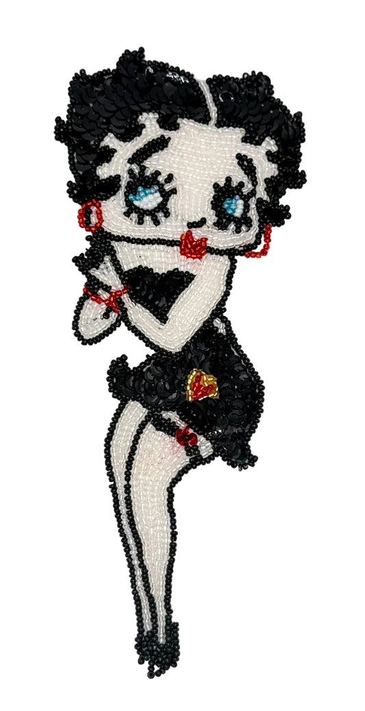 Vintage Betty Boop character patch with black hair, white face, and red accents on a white background