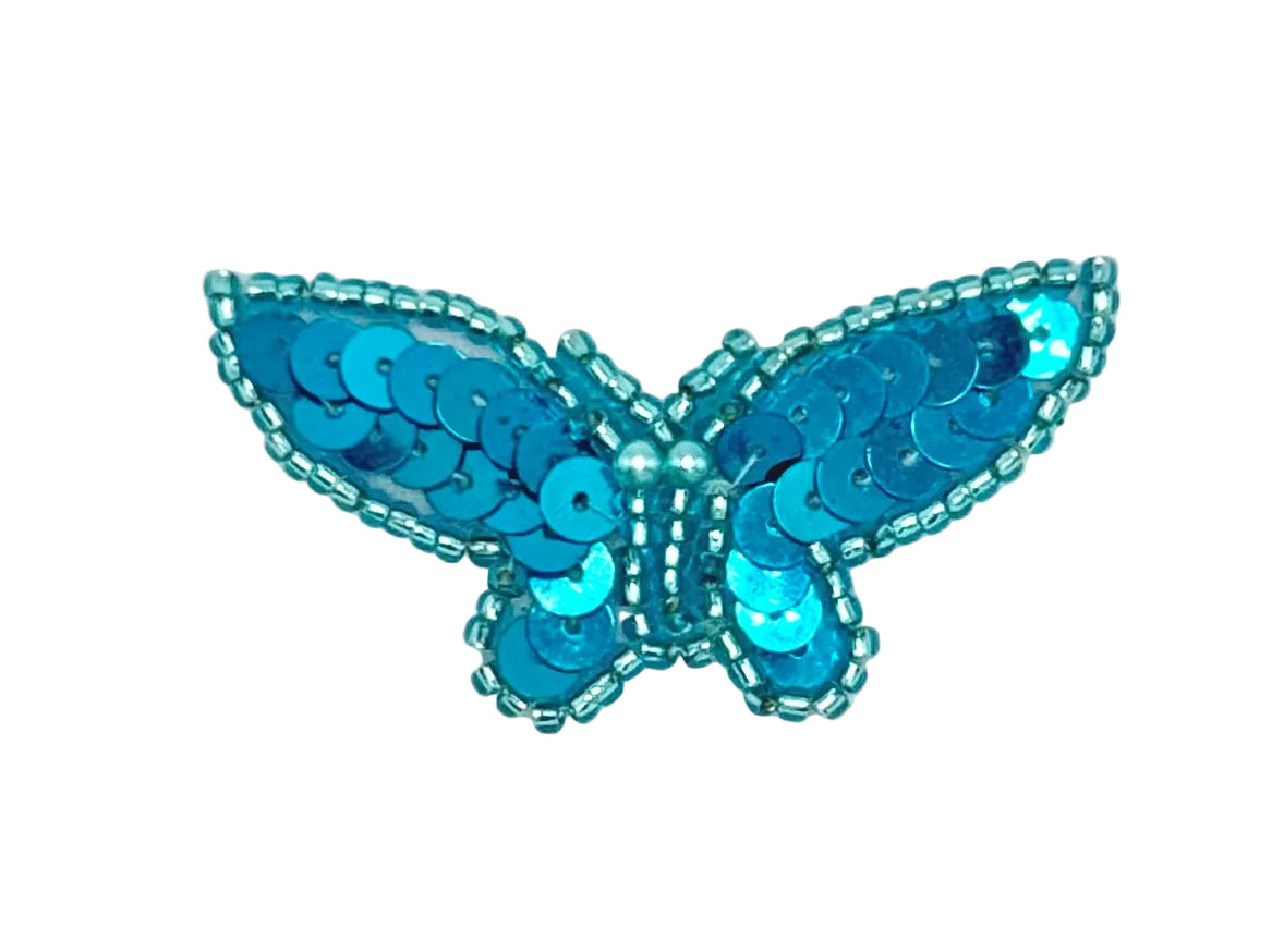 Turquoise butterfly patch with sequins and beads on a white background