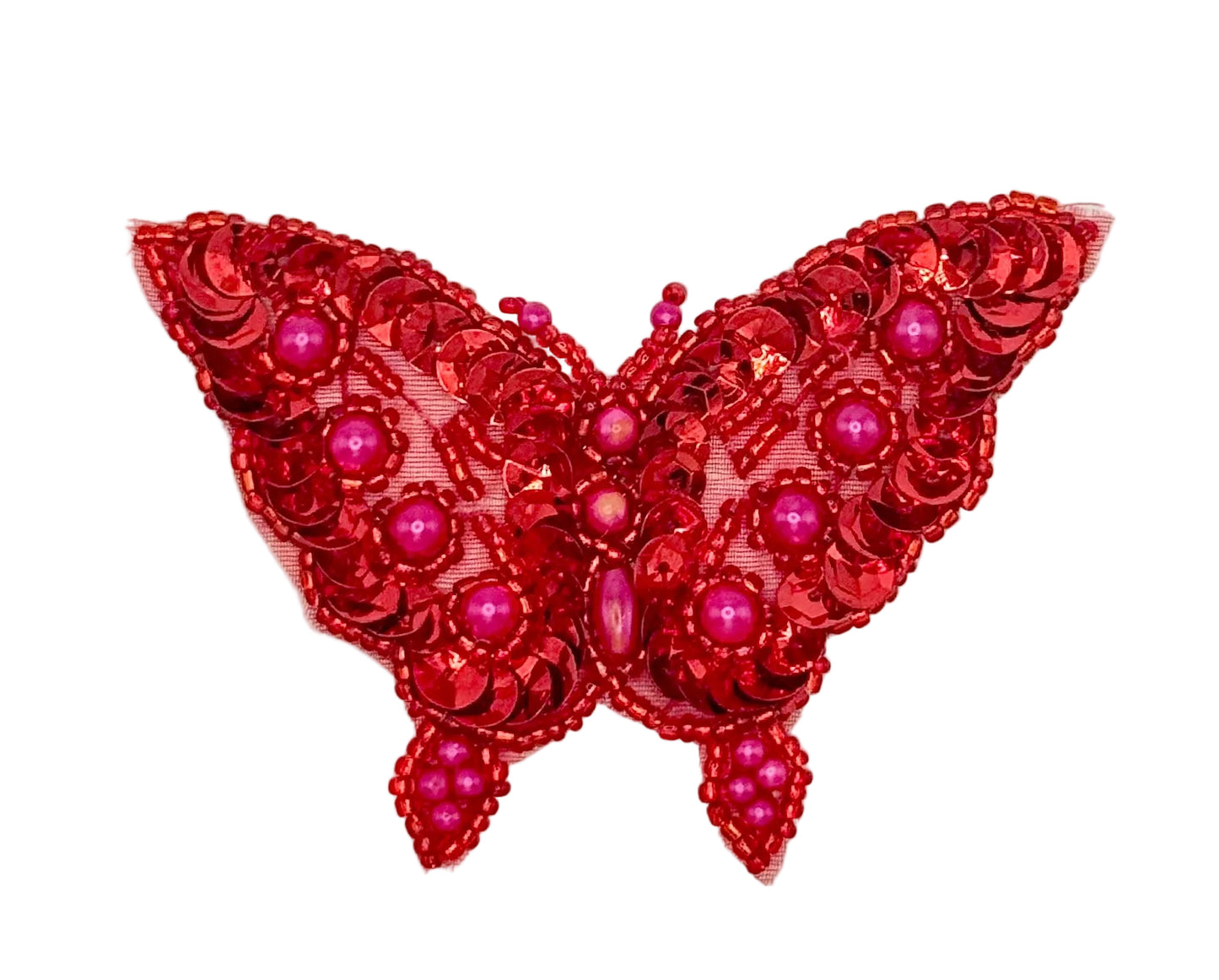 Red butterfly-shaped decorative item with sequins and beads on a white background