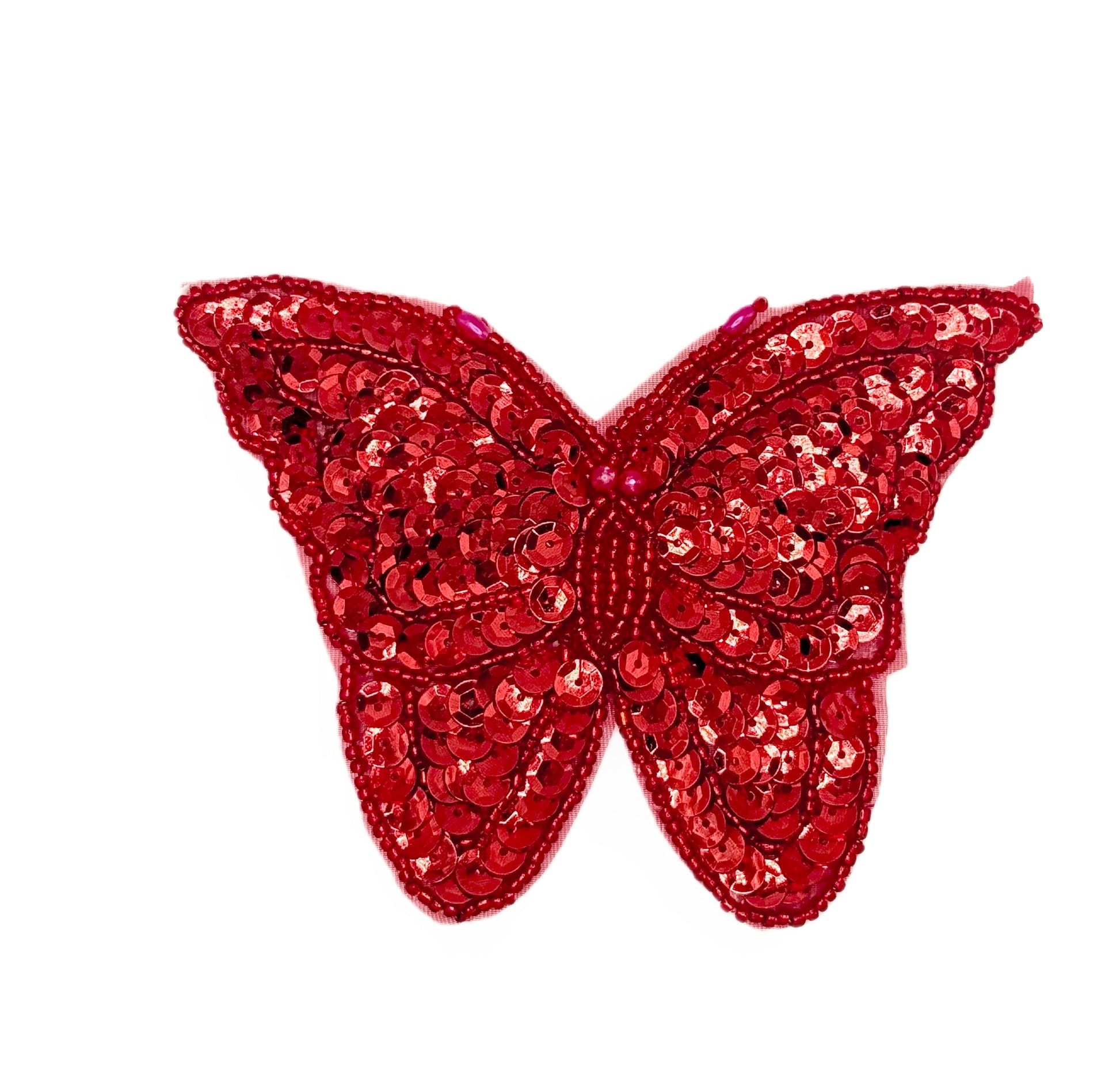 Red sequin butterfly patch on a white background