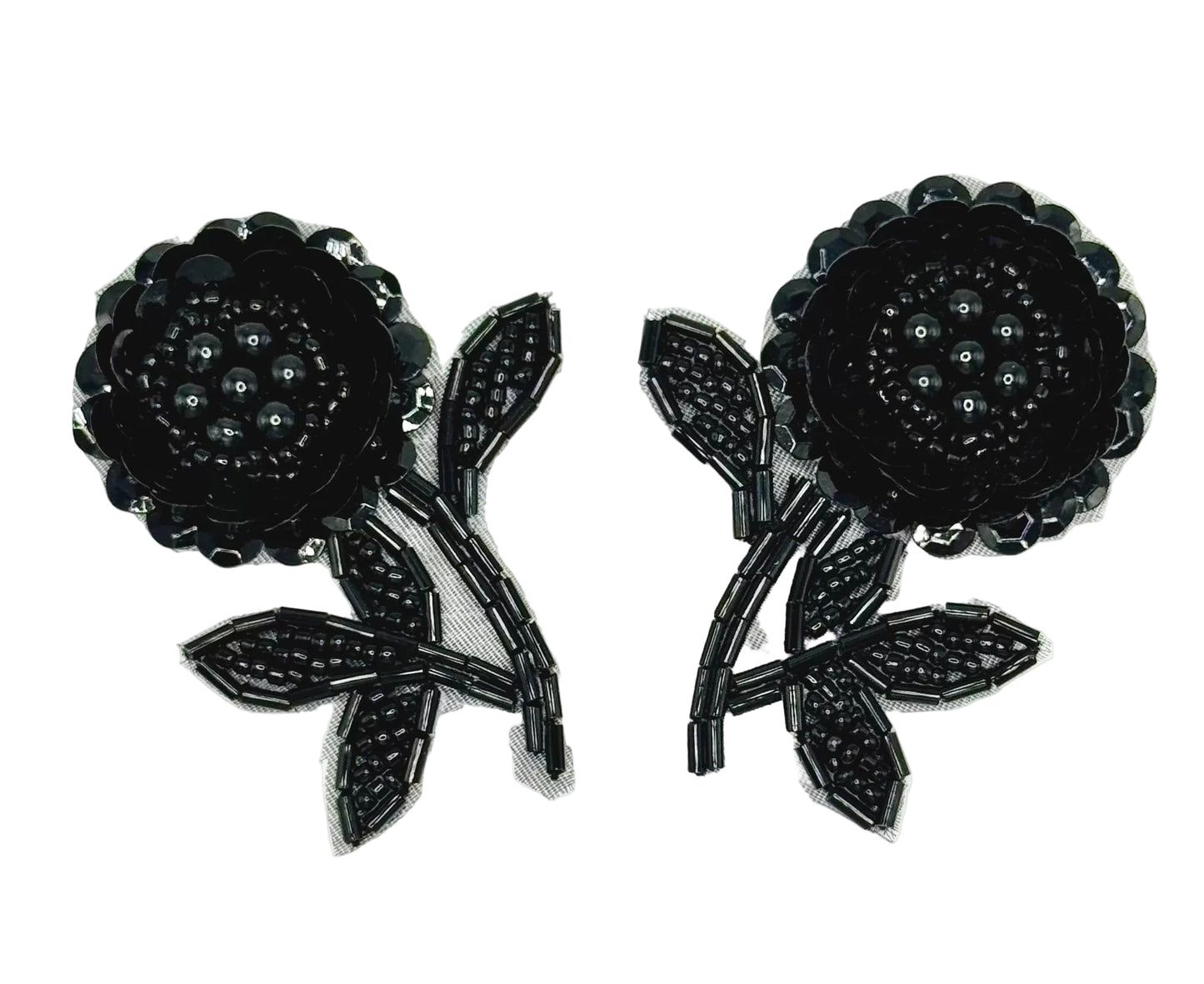 Pair of black floral sequin patches on a white background