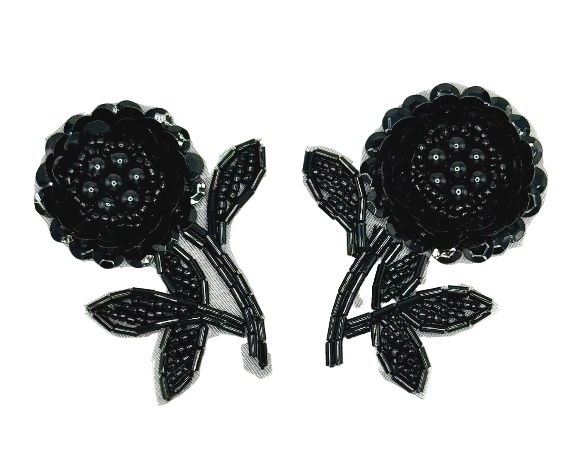 Pair of black floral sequin patches on a white background