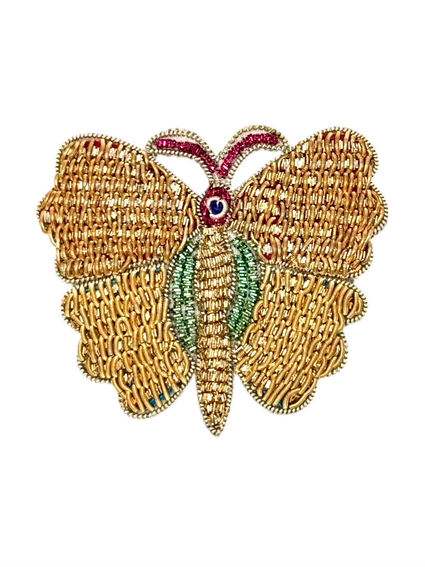 Gold butterfly patch with green and fuchsia details on a white background
