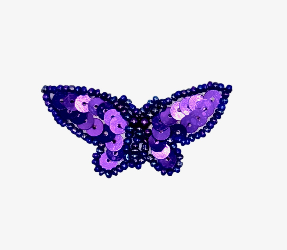 Purple butterfly-shaped sequin patch on a white background