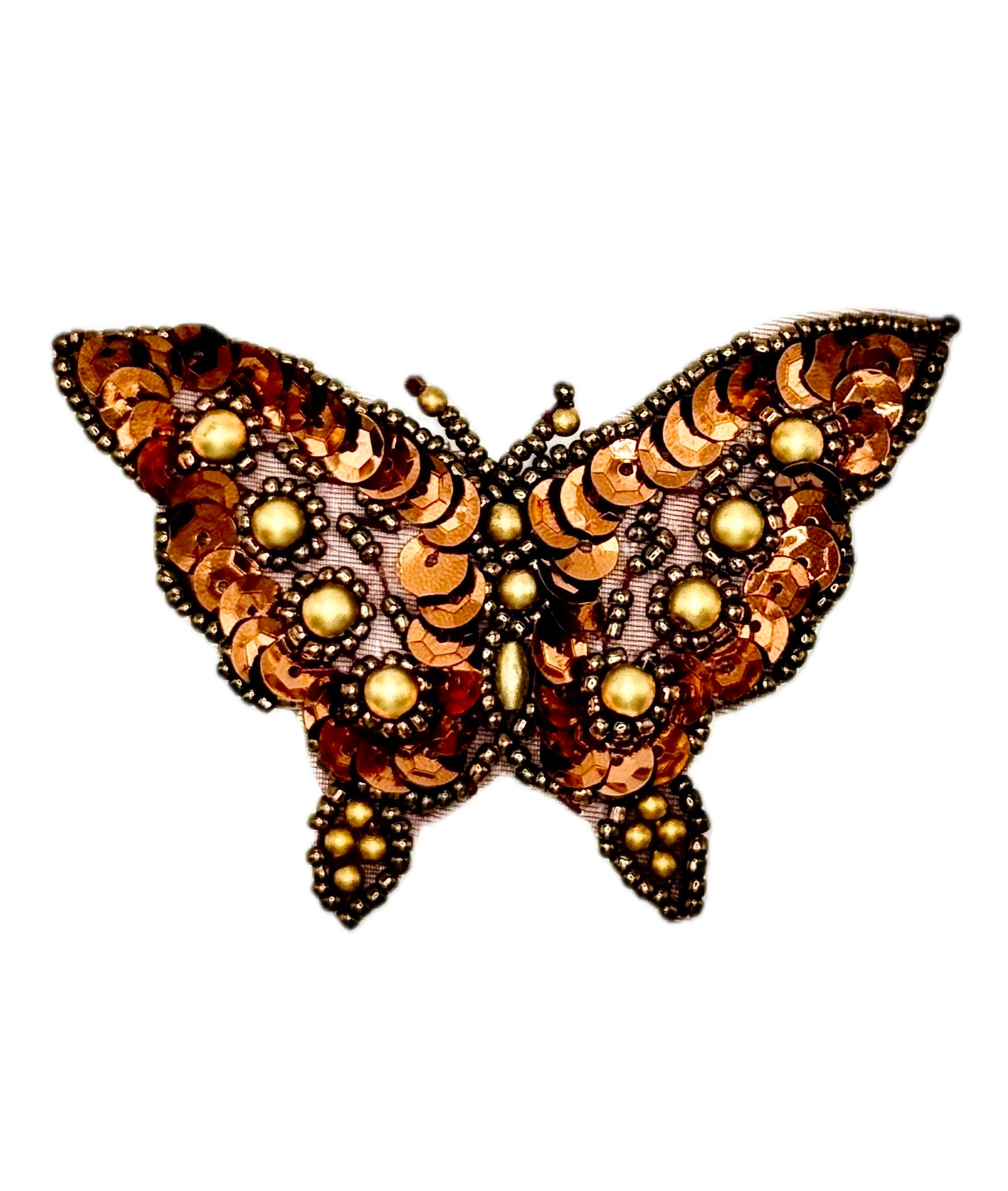 Butterfly-shaped bronze colored patch with sequins and beads on a white background