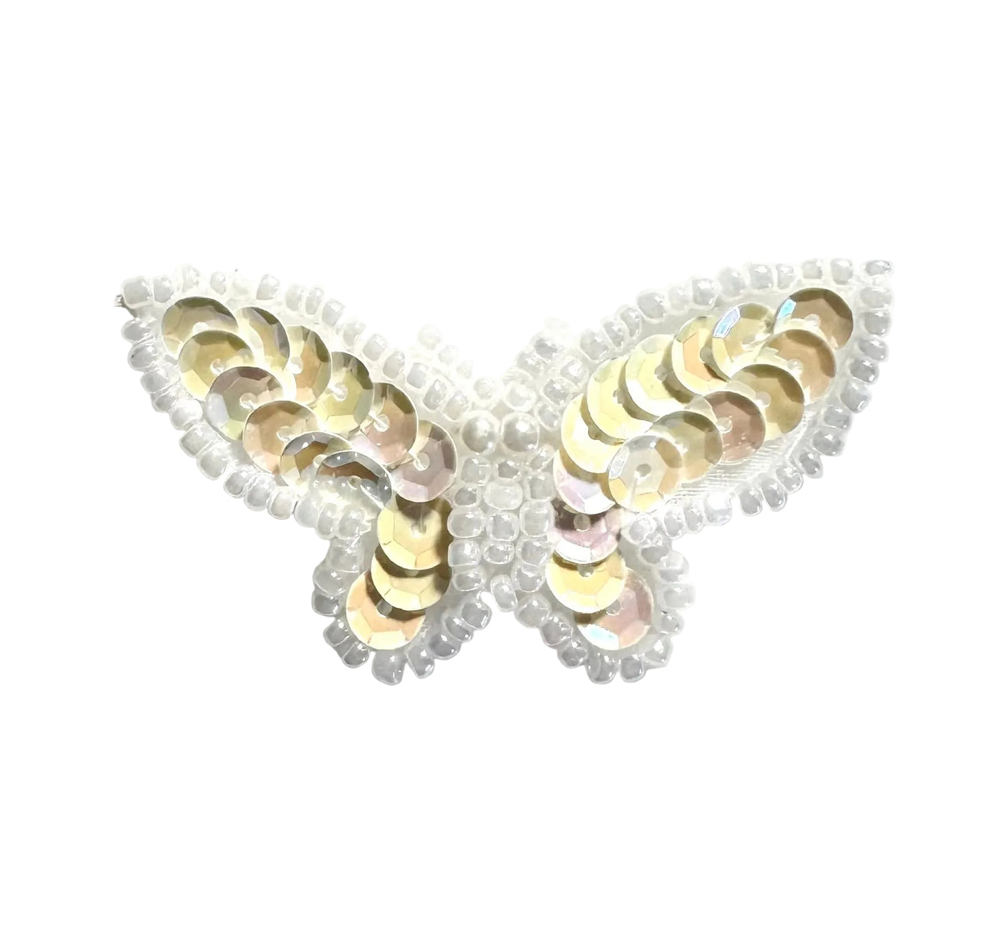 Butterfly-shaped patch with Iridescent cream sequins on a white background