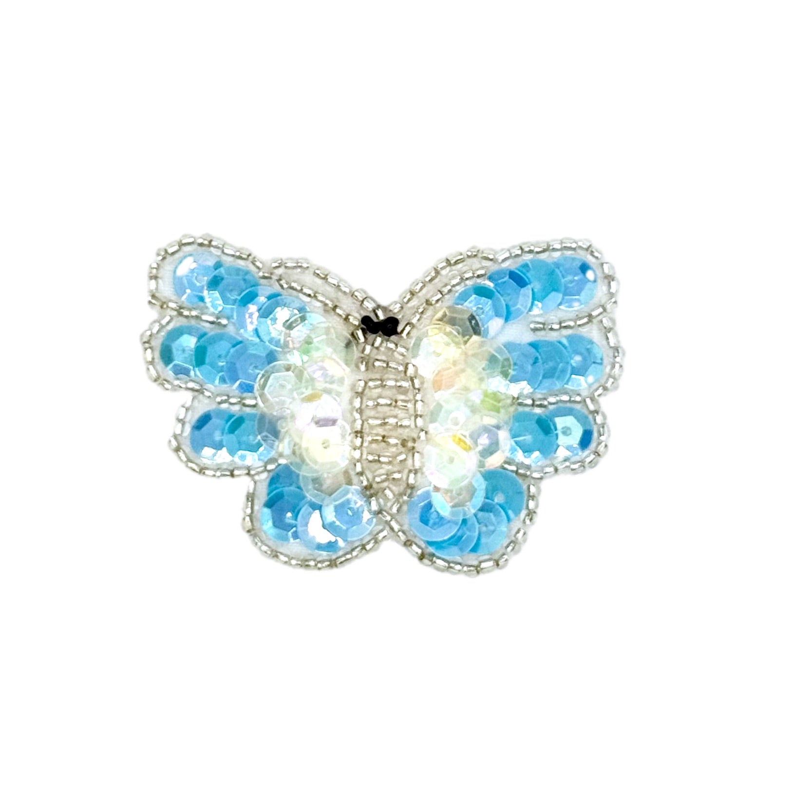 Butterfly-shaped patch with light blue sequins on a white background