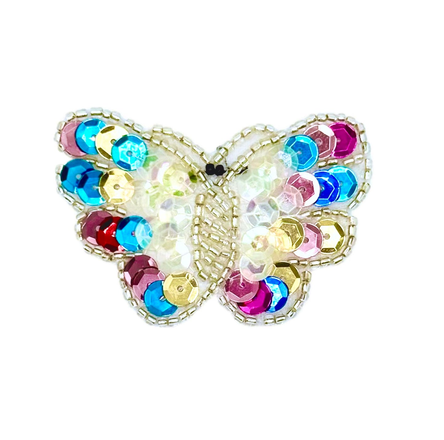 Butterfly-shaped patch with colorful sequins on a white background
