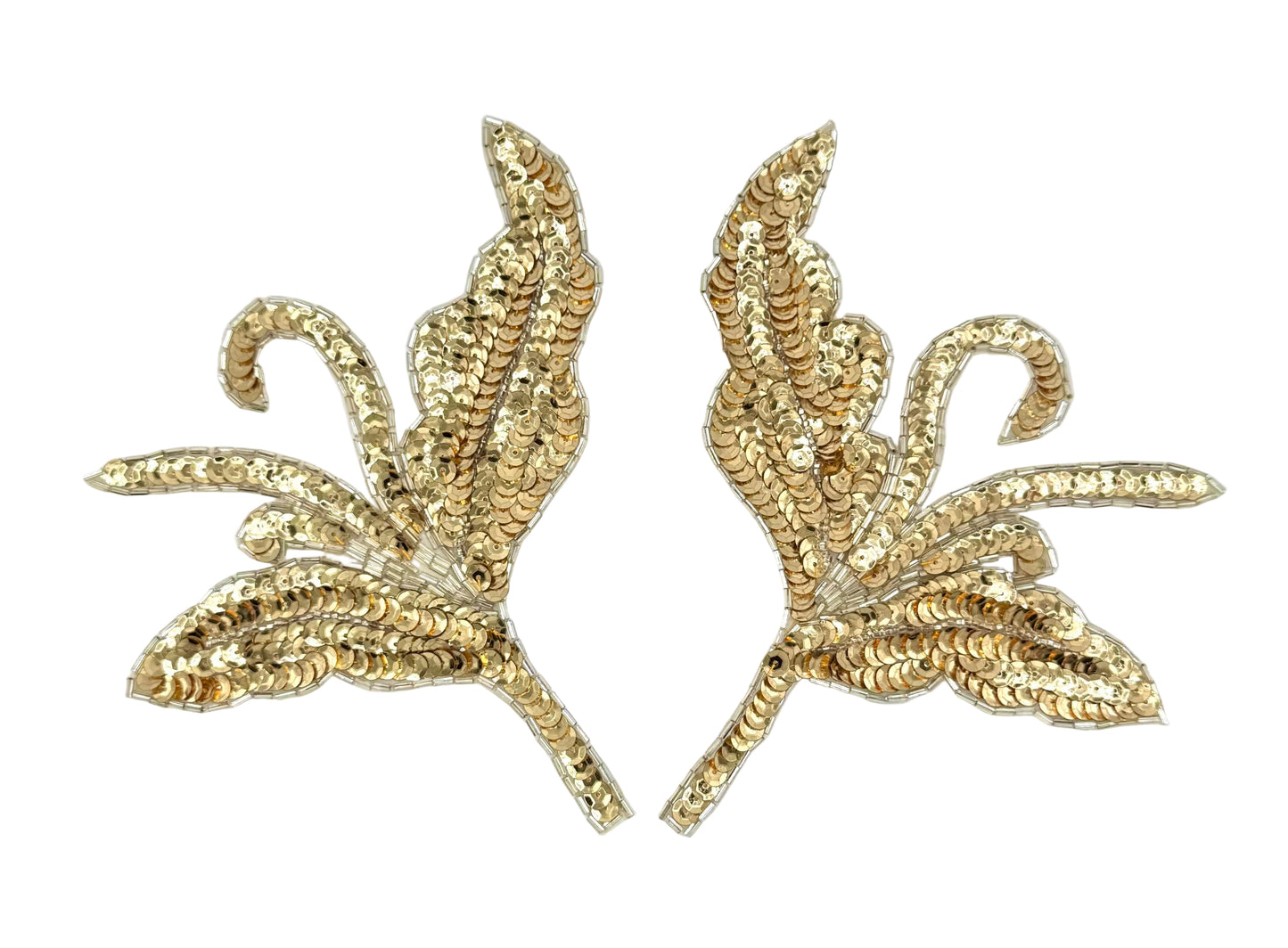 Pair of gold and silver sequin and bead floral patches on a light gray background