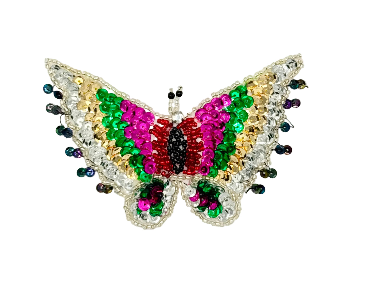 Colorful butterfly-shaped patch with sequins on a white background