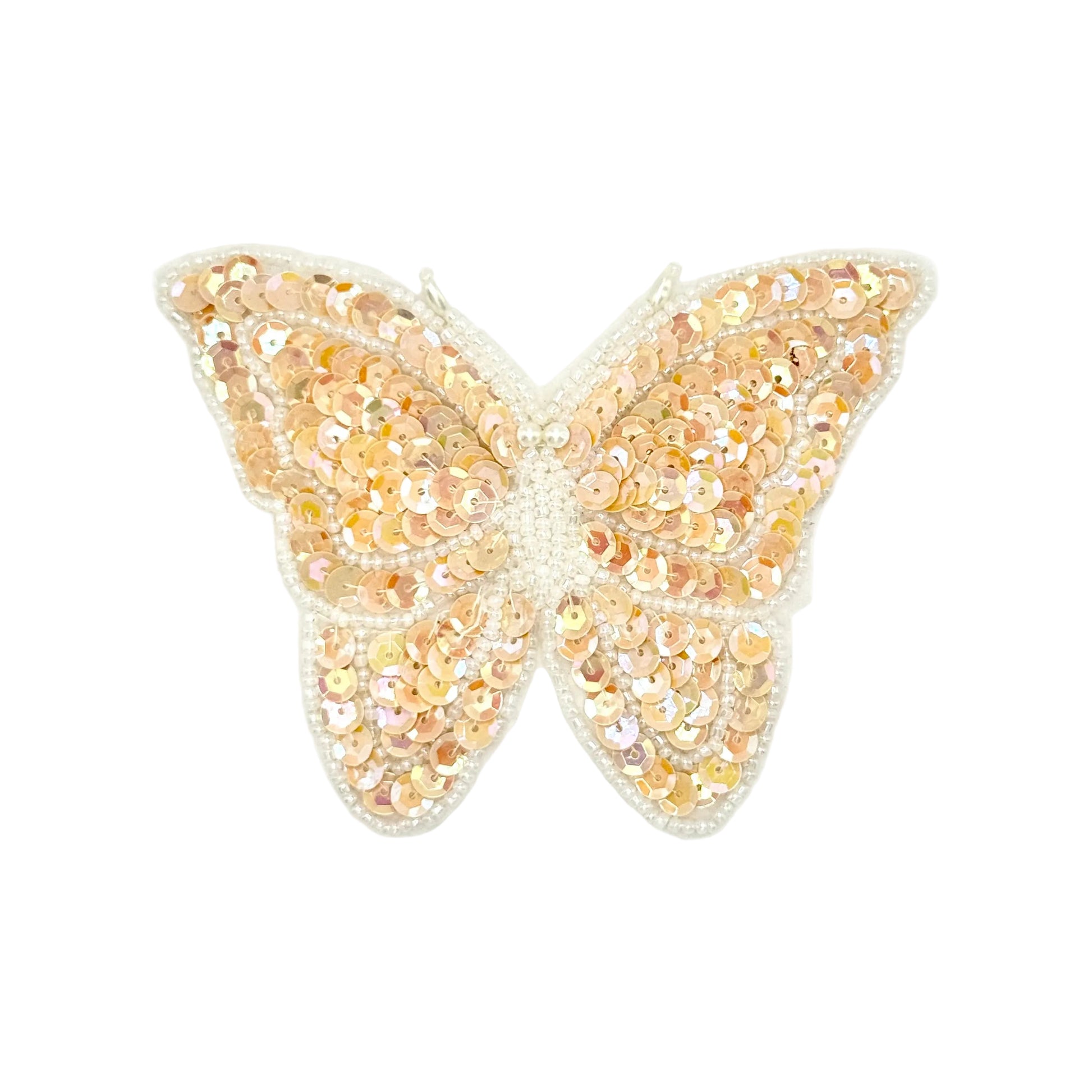 Iridescent Beige sequin butterfly patch on a white background