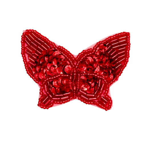 Red butterfly-shaped sequin patch on a white background
