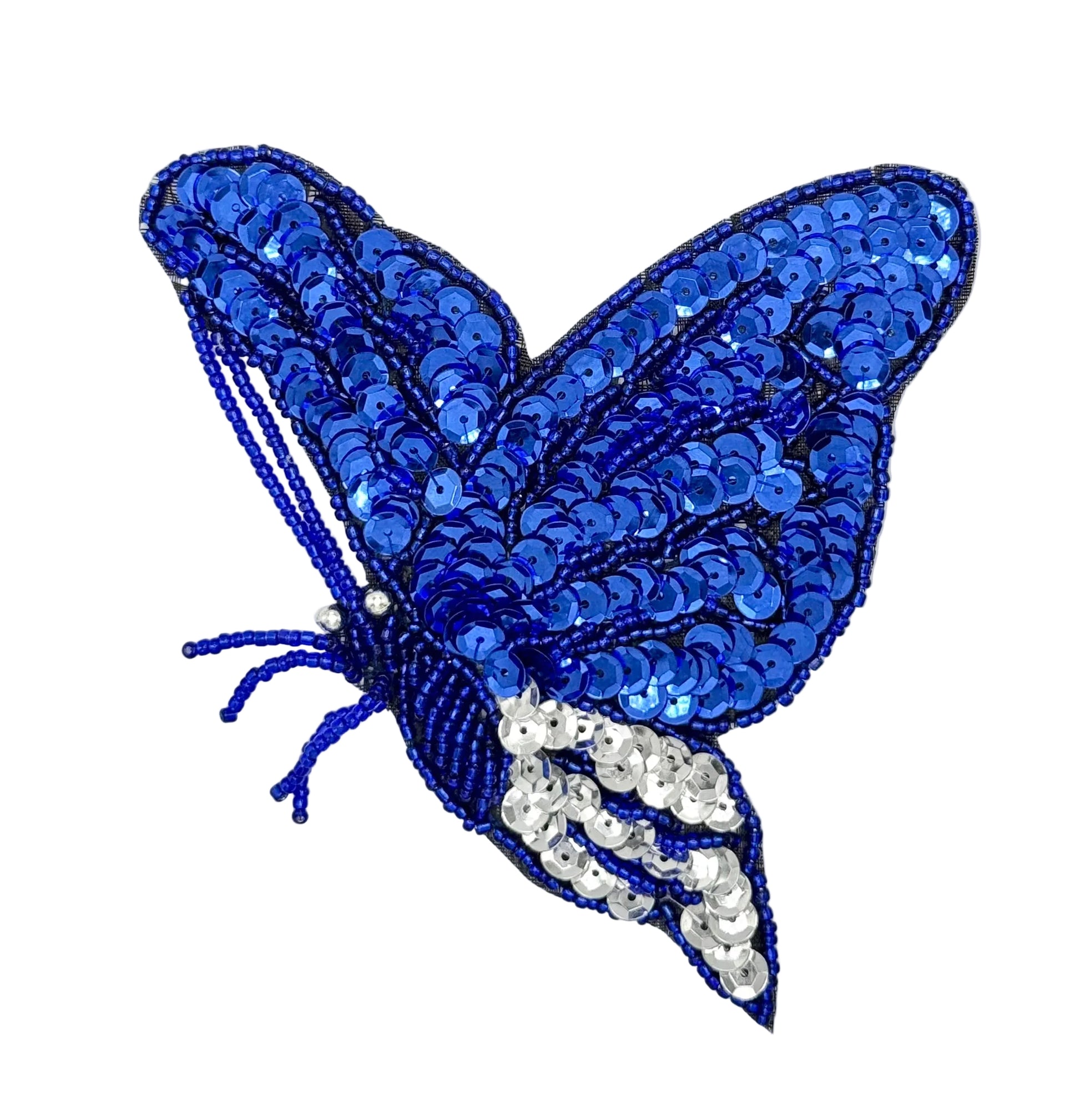 Blue butterfly-shaped decorative item with sequins on a white background
