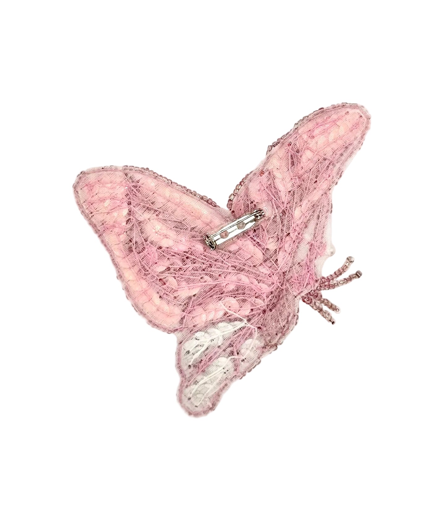 Pink butterfly-shaped patch on a white background