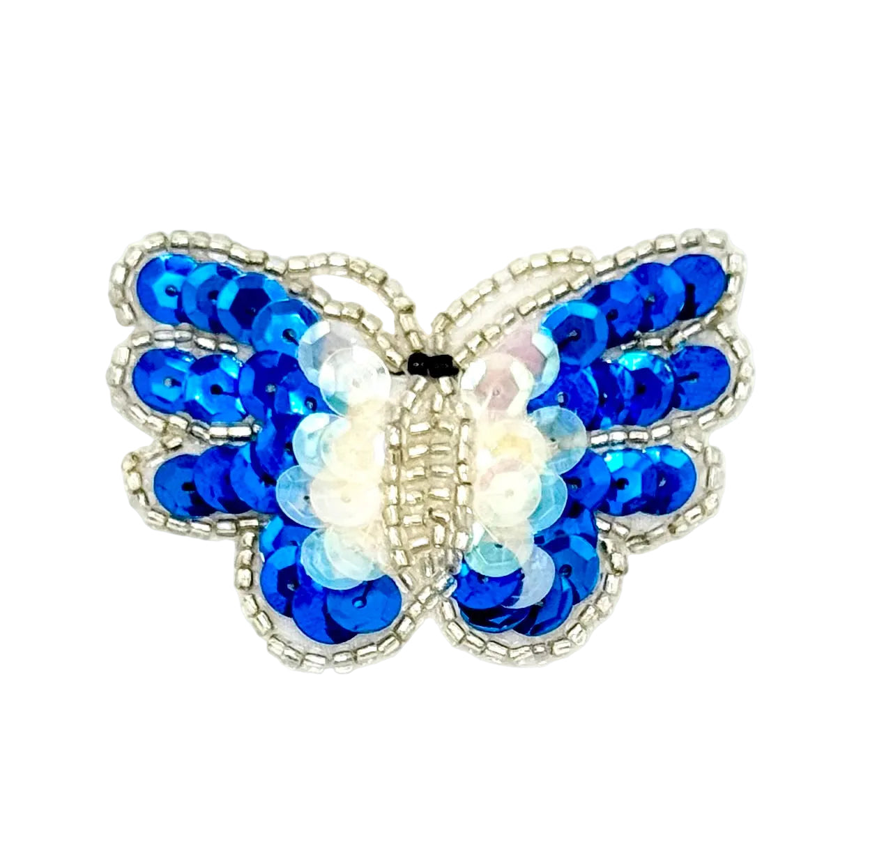 Butterfly-shaped decorative item with blue and white sequins on a white background