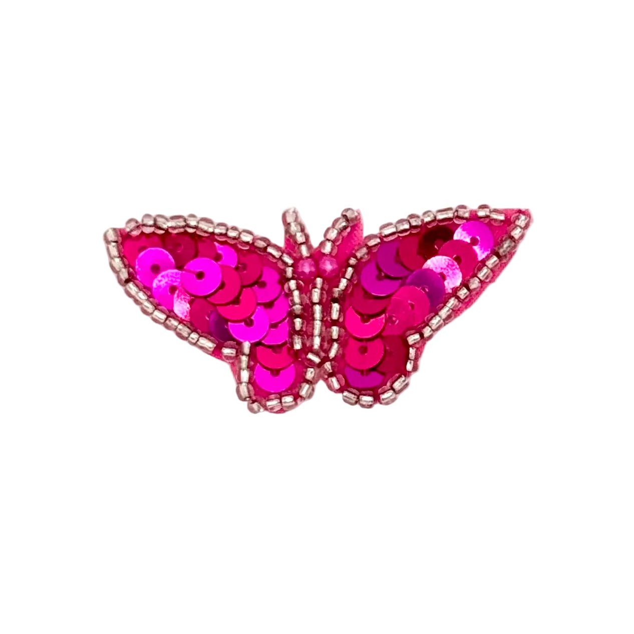 Pink butterfly with sequin wings on a white background