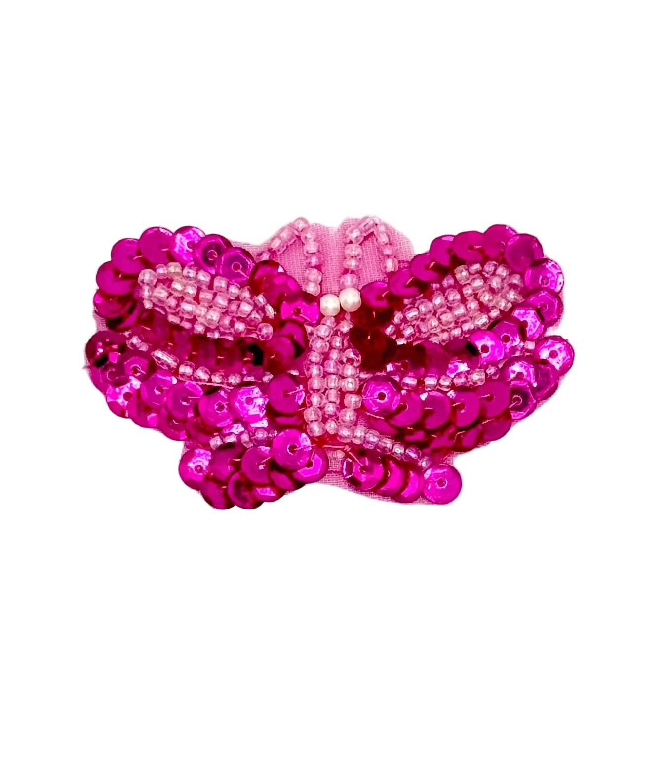 Pink butterfly-shaped patch with sequins on a white background