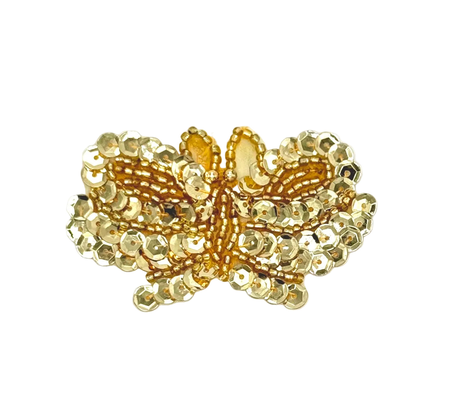Gold butterfly-shaped patch with beaded details on a white background