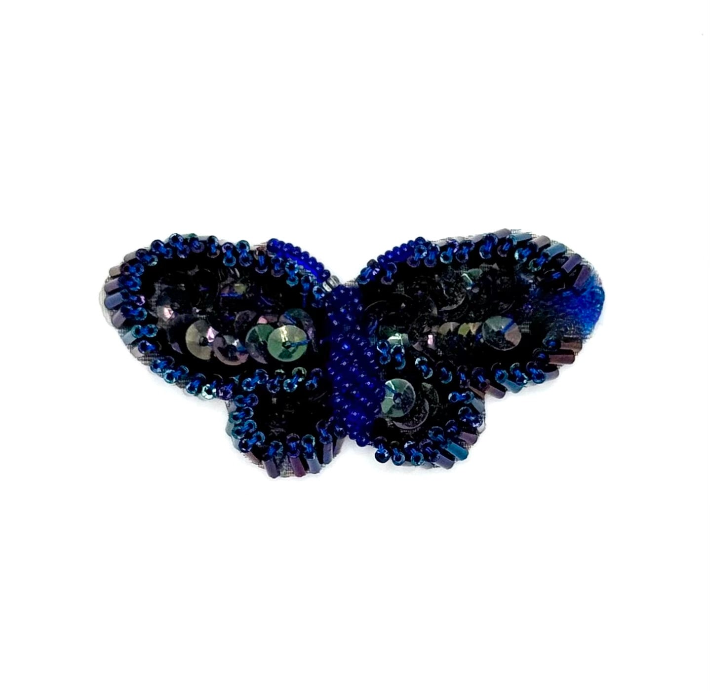Black and Blue beaded butterfly-shaped patch on a white background