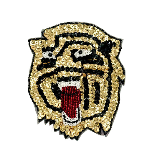 Sequin tiger head roaring on a white background