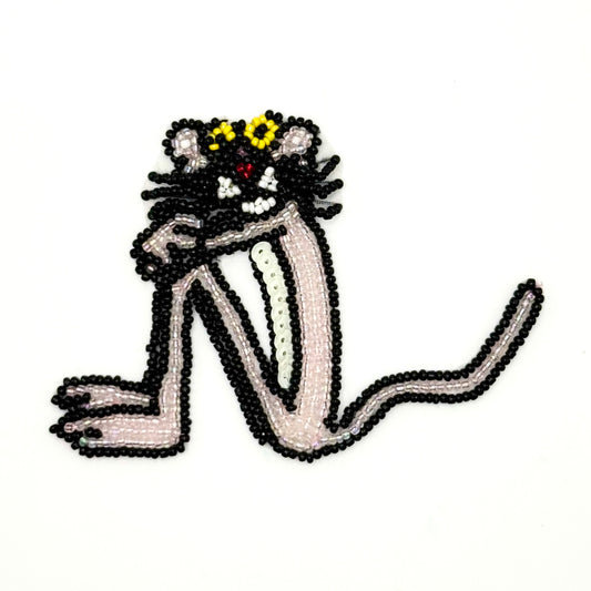 Sequin and bead light pink panther on white background