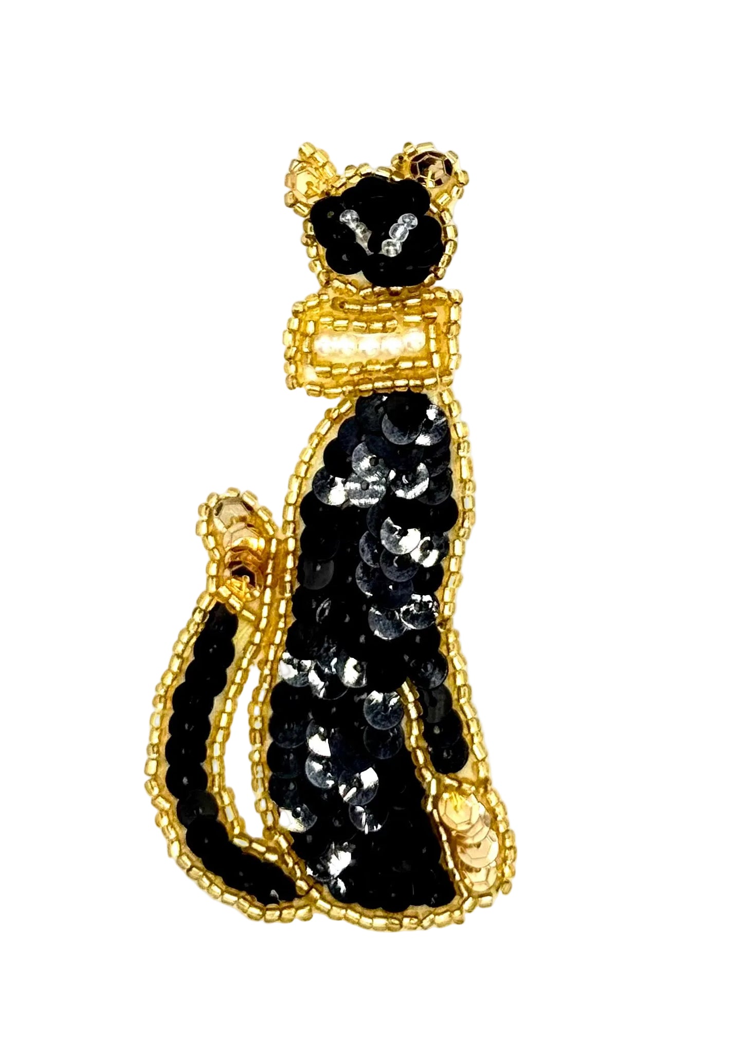 Black sequin cat-shaped patch with gold detailing on a white background
