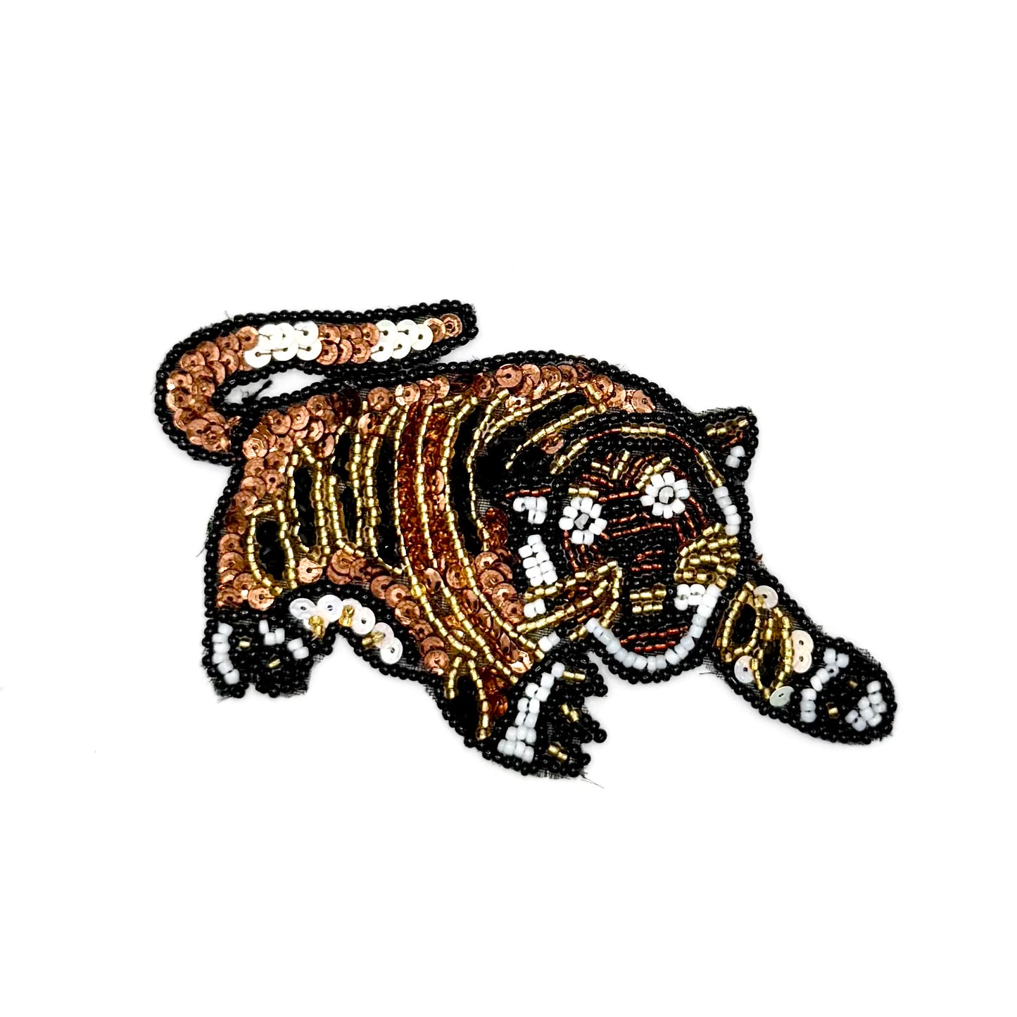 Sequin and bead tiger on a white background