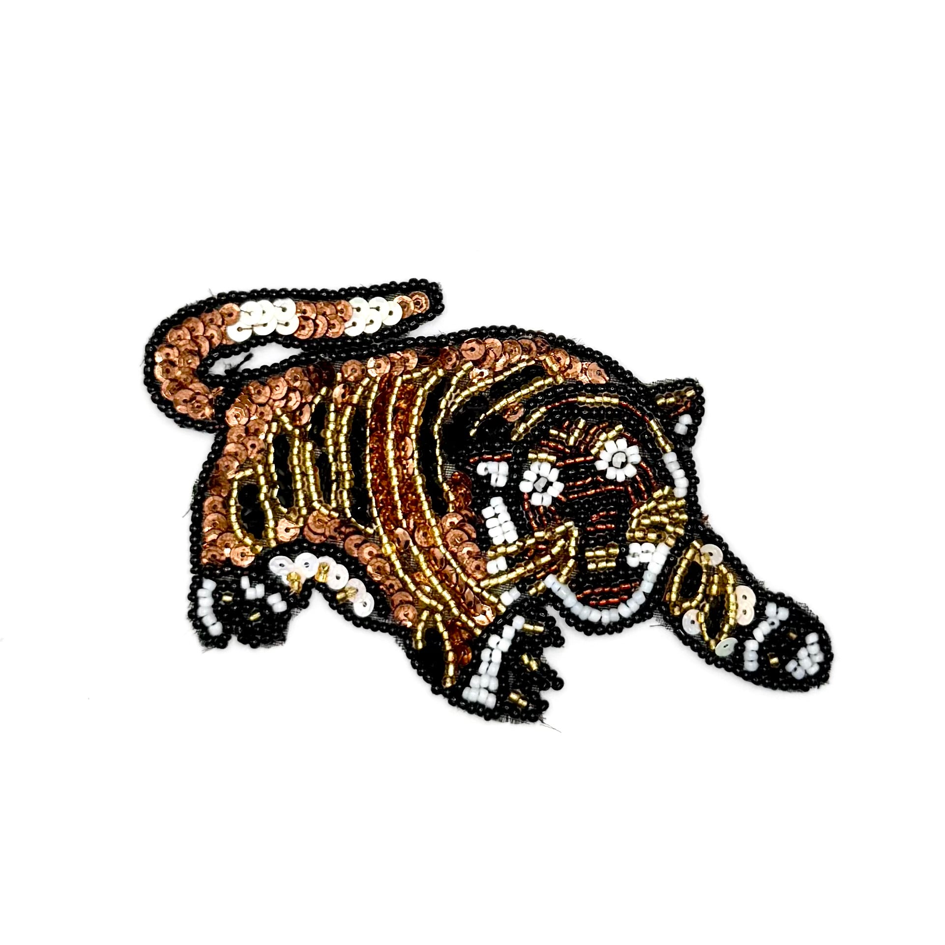 Sequin and bead tiger on a white background