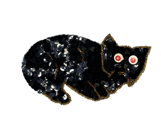 Sequin and bead cat patch on a white background