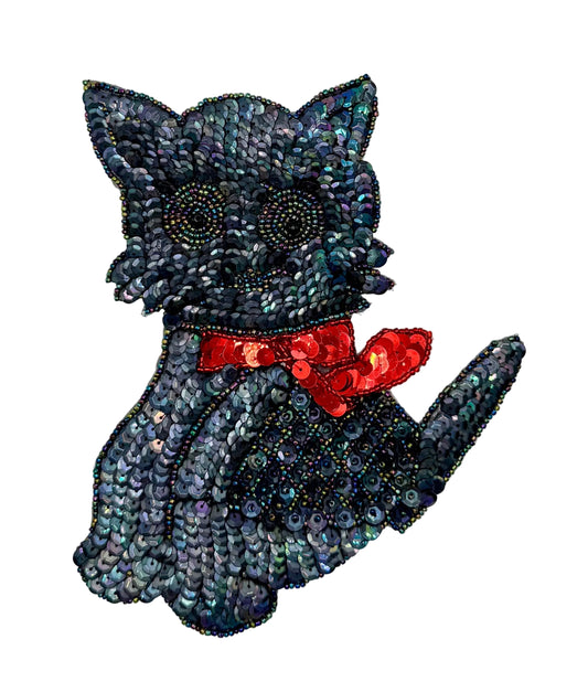 Sequin and bead cat on a white background