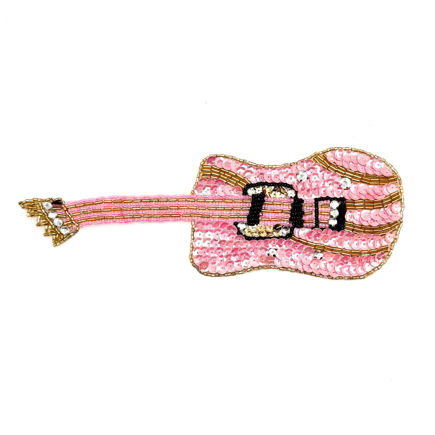 Pink sequin guitar-shaped patch on a white background