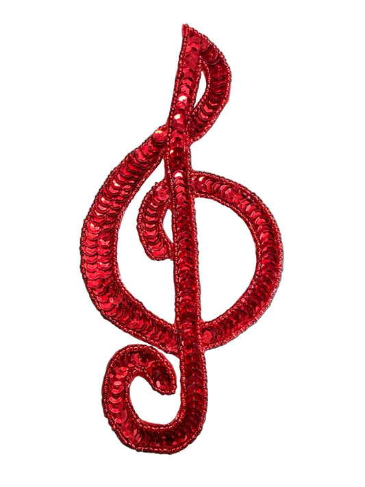 Clave de sol con lentejuelas y cuentas rojas 7.5" x 3.5"