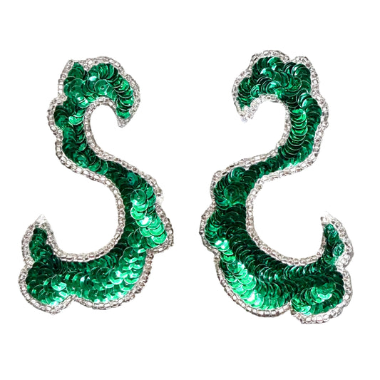 A pair of sequined letter 'S' patches in vibrant green with silver beaded trim, shown on a plain white background.