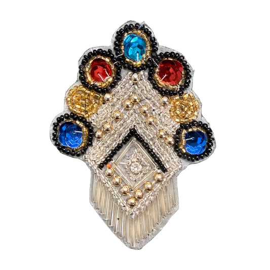 Escudo con gemas multicolores