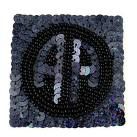 Emblem with Moonlite Laser Spotlight Sequins and Black Beads