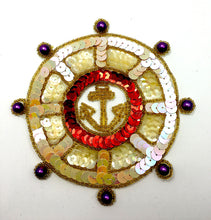 Load image into Gallery viewer, Ships Wheel with Gold Anchor, Cream Sequins and Purple Pearls 5.25&quot;
