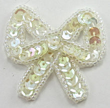 Load image into Gallery viewer, Bow with Iridescent Sequins and Beads 1.5&quot; x 2&quot;
