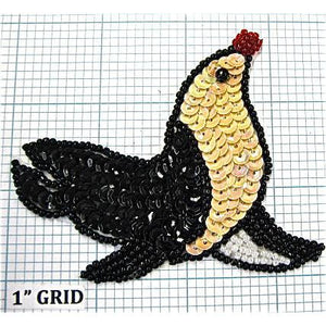 Seal, with Cream and Black sequins and Black, Red Beads 3.75" x 3"