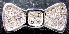 Load image into Gallery viewer, Necklace Pendant Bow with Silver and Rhinestones 1&quot; x .5&quot;