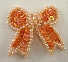 Load image into Gallery viewer, Bow Orange with Pearl Trim 1.25&quot; x 1&quot;