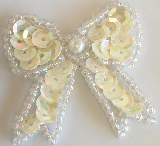 Bow with White Iridescent Sequins and Iridescent  Beas - Center Pearl 1.25' x 1.50"
